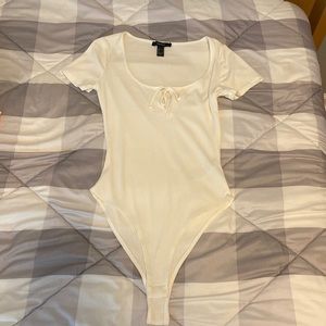 White shirt sleeve body suit